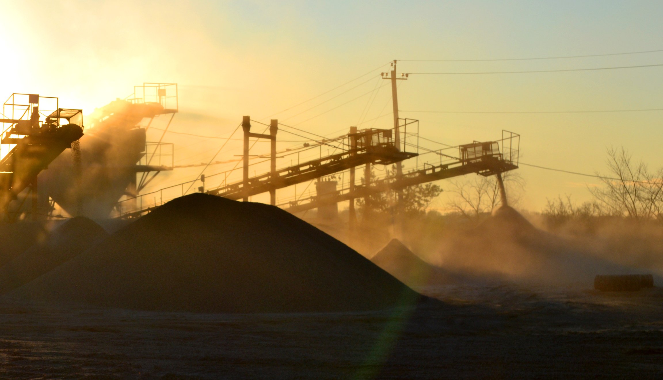 Mining Quarry. Crushing Plant in Granite Quarry at Sunset Dawn Crusher in Quarry